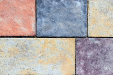 Cobblestone Pavers abstract mosaic background. Colored cobble stone texture. Close-up of street pavement
