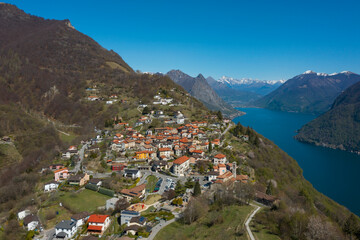 Fototapeta na wymiar Aerial view of Lugano lake and the Monte Brè village in Canton Ticino in southern Switzerland