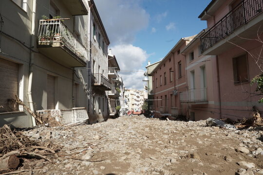 Debris and mud deposited in the streets after flood