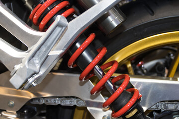 red Shock Absorbers part of Motorcycle for absorbing jolts