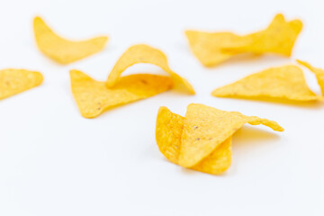 Corn chips , nachos isolated on white background
