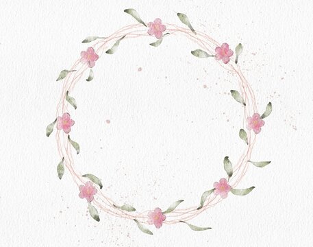 Watercolor wreath with branches, pink flowers and green leaves with splatters