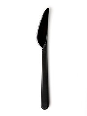 Plastic black disposable knife isolated on a white background. Disposable tableware.