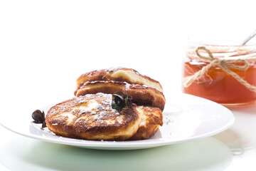 sweet fried cottage cheese pancakes in a plate