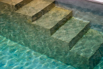 Stairs leading down into a pool