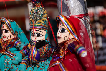 Fototapeta na wymiar Puppet Show, Rajasthani colorful hand made puppet on display.