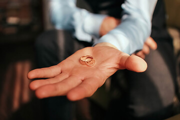 Fototapeta premium A pair of gold wedding rings