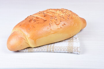 Cheese bread, on white wooden background