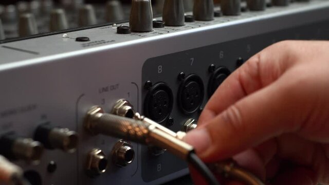 preparing sound mix panel for operation . Music record stage equipment	