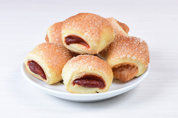 Puff pastry guava cake, on white wooden background
