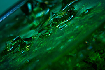 Glass flask. Liquid and crystals. Colored liquid.