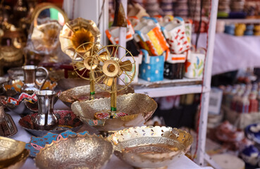 Brass designer lock products in Indian souvenir store.