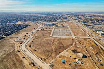 Drone photography of a large residential neighborhood and new business construction site in Eagle,...