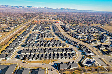Drone 4k footage of a large residential neighborhood in Eagle, Idaho looking towards Boise, Idaho