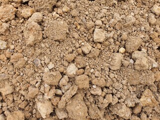 Filled soil prepared to adjust the surface for building construction.
