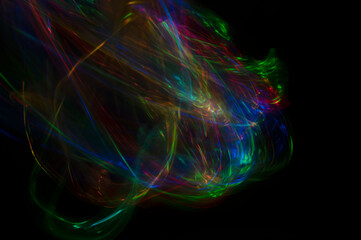 Fototapeta na wymiar Abstract colorful blurred background on black