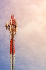Telecommunication tower with antenna and blue sky