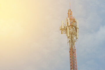 Telecommunication tower with antenna and blue sky