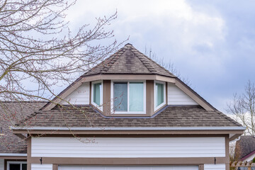 Top of a very neat and colorful home with gorgeous outdoor landscape in suburbs of Vancouver, Canada