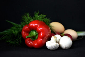 Still life of vegetables on black background,cover for banners and food inustry