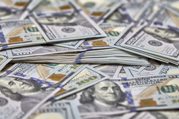 100 USD banknotes lots of background texture close up money