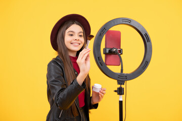happy teen girl blogger use selfie led lamp and smartphone, makeup tutorial.