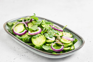 Spring refreshing cucumber onion salad. Space for text.