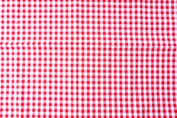 Dining table cloth texture, checkered table, red, white pattern for background, backdrop. Used for cover dining table in kitchen room.