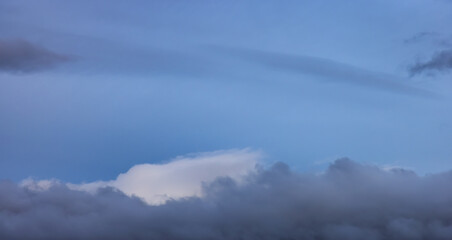 Panoramic View of Puffy Clouds over the Canadian Mountain Landscape. Colorful Winter Sunset Cloudscape Background. Taken in Whistler, British Columbia, Canada.