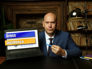 Business concept meaning Gross Incidence with sign on laptop.