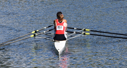 Womens  Pairs Sculling on the river Ouse red tops. © harlequin9