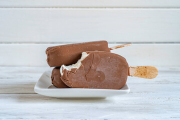 Homemade Chocolate Covered Ice cream on white background.
