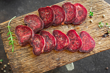 beef jerky sausage dry veal spicy mahan dry-cured horse meat snack healthy meal top view copy space food background 