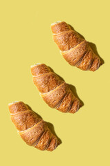 croissant colored background sweet bake dessert bun snack healthy meal top view copy space rustic food background top view