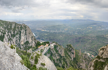 View towards Montserrat Abbey and valleys bellow it, Barcelona, Spain.