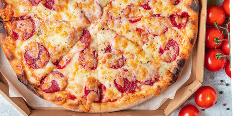 pizza pepperoni sausage tomato sauce and cheese trend fast food meal copy space food background rustic. top view