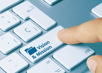 Vision & Mission - Inscription on Blue Keyboard Key.