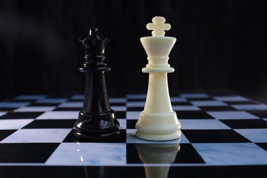 Game of chess. Chess is photographed on a chessboard.  Table games.  Strategy games.  Creative minimal concept. Strategy, management or leadership concept.  Business success concept.