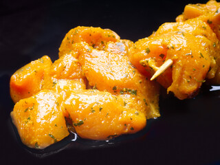 Raw chicken meat with marinade for Moorish skewer