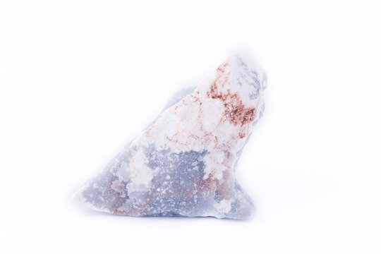 macro mineral anhydrite stone on a white background