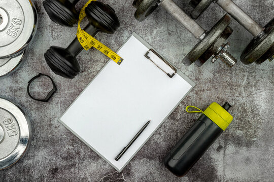 workout concept with grip cast iron olympic weight plates