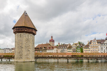 Chapel bridge is located on Lucerne historical city center, it's the famous and symbol of Switzerland's main tourist attractions.