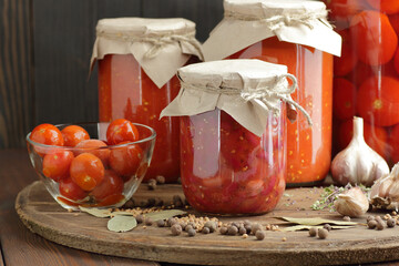 Canned kidney bean in tomato paste in glass plastic free jar on rustic table, closeup, canned...