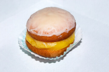close-up of a fresh and tasty petit-four on white backround. selective focus