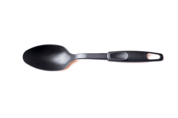 black plastic spoon