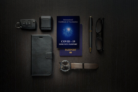 COVID-19 Immunity Passport On Table With Technology