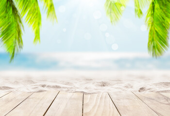 Wooden table top on blue sea and white sand beach background. - 426750044