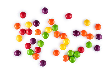 Heap of colored round dragee sweets isolated on white background, top view, flat lay. Multicolored.candy