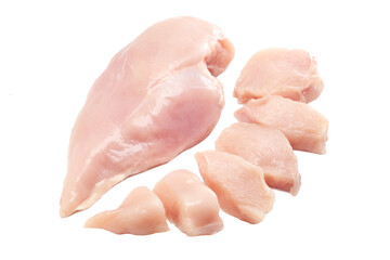 Fresh raw chicken breast fillet whole and sliced isolated closeup on white background, clipping path