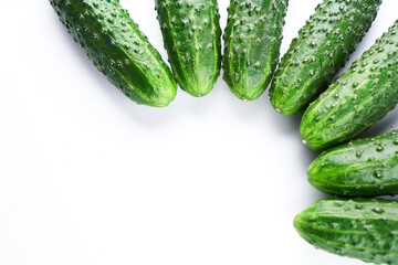 Set of fresh whole cucumbers on white background, food pattern. Garden cucumber wallpaper backdrop design
